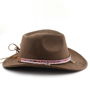 Detail of dark brown cowboy hat with ethnic woven band and shell pendants