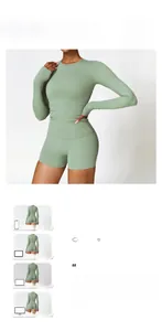 Détail de l'ensemble haut court à manches longues et short taille haute vert menthe en tricot