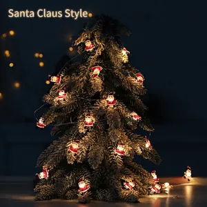Warm LED Santa Claus string lights wrapped around a snowy pine tree for Christmas decor