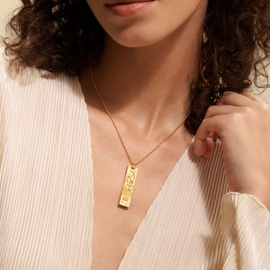 Gold tarot card pendant necklace with celestial motifs and 18K plating on beaded chain