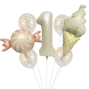 Detail showing cream number 1 balloon with candy and ice cream balloons for first birthday