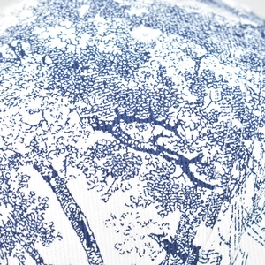Macro shot of blue Toile de Jouy jungle pattern on heavy cotton canvas fabric