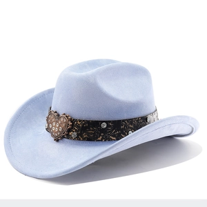 Detail of lavender cowboy hat featuring vintage paisley band and ornate heart buckle