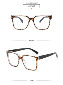 Detail view of square leopard print TR90 frames with clear upper rim and black temples