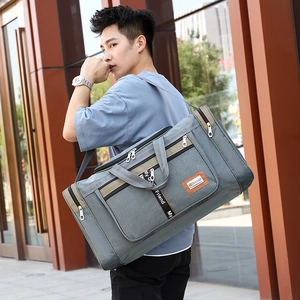 Grey Oxford fabric fitness travel duffel bag with shoulder strap and stylish text straps
