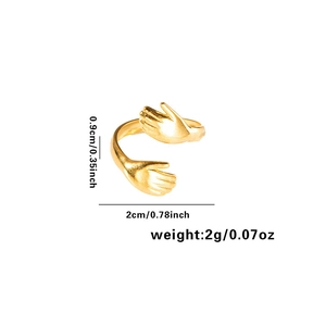 Detail view of 18K gold hand-shaped ring with weight 2g and dimensions 0.9x2cm
