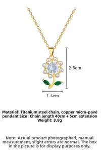 Detail of sunflower pendant with pearls and crystals on a gold titanium steel chain
