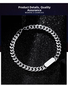Close-up of a silver Cuban link bracelet with a polished blank rectangle ID tag