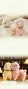Detail of plush alpaca toys in white, pink and yellow with golden bells and leather collars