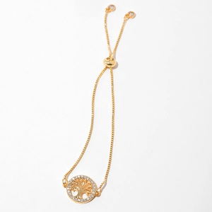 Detail of gold tree of life bracelet with crystal pavé and adjustable sliding clasp