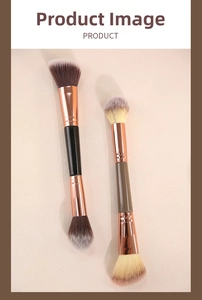 Close-up of dual-ended makeup brushes with rose gold ferrules and soft fiber bristles
