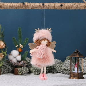 Pink plush angel Christmas tree ornament with golden antlers hanging on jute rope