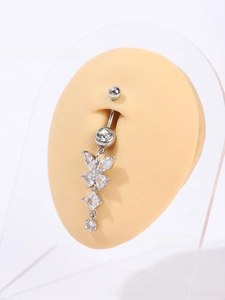 Detail of silver butterfly belly ring with sparkling AAA zircon pendants on model