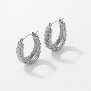 Chunky silver C-shape croissant hoop earrings with twisted spiral texture for women