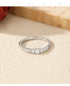 Macro shot of S925 sterling silver stacking ring with shimmering moissanite stones