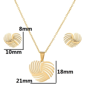 Macro view of gold heart necklace and earrings set with detailed size measurements