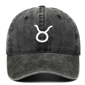 Washed cotton Taurus zodiac embroidered baseball cap in charcoal grey with curved brim