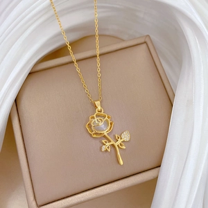 Elegant gold rose pendant necklace with cat-eye opal pearl and sparkling crystals