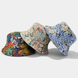 Floral reversible wide brim bucket hats in tropical and vintage flower patterns