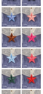 Macro detail of multicolored star embroidery patches showing 2.9cm size and texture