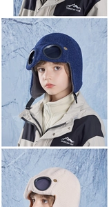 Winter aviator knit hat for kids featuring protective goggles and cozy ear flaps