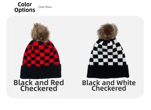 Detail of plaid knit beanies with faux fur pom-poms in black-red and black-white checkers
