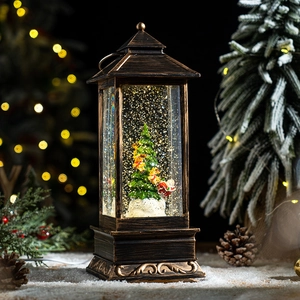 Vintage bronze Christmas lantern with Santa and tree miniature light-up snow globe decoration