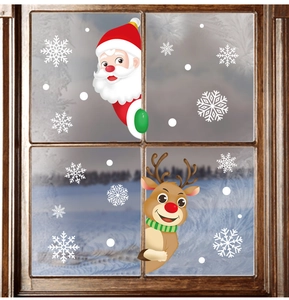Close-up of Santa Claus and reindeer static window decals with various snowflake patterns