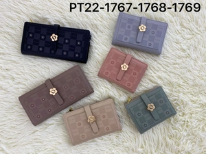 Detailed flat lay of women's wallets with floral pattern and petal metal buckle