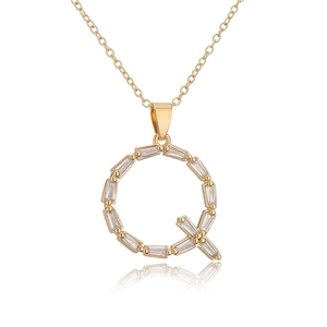 Detail of 18K gold plated copper necklace featuring a zircon encrusted letter Q pendant