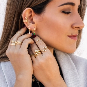 S925 sterling silver snake ear cuff and gold jewelry set styled on a model's face