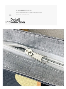 Detailed close-up of high-quality silver metal zipper on a grey canvas tote shoulder bag