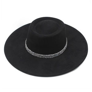 Detailed view of British style wide brim felt hat with sparkling silver rhinestone band