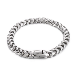 Polished silver stainless steel Franco chain bracelet with secure box clasp on white background