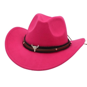 Detail of rose red felt cowboy hat with two-tone band and silver metal bull head ornament
