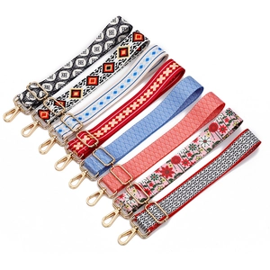 Adjustable crossbody bag straps with ethnic patterns and gold metal buckles