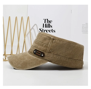 Detail view of khaki washed cotton cadet cap with classic sport logo patch and rivet