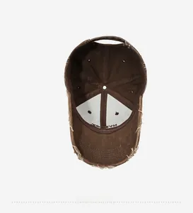 Inside view of washed cotton baseball cap showing 6-panel structure and vintage stitching