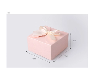 Pink square fold-able gift box featuring a cream satin bow and wavy edge design, 9x9x5cm
