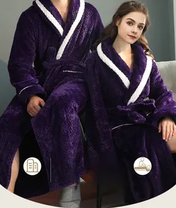 Detail of dark purple thick flannel bathrobe with white trim and textured waffle pattern