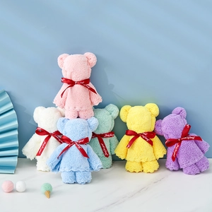 Detail of coral fleece bear towels in six pastel colors with Just for you ribbons