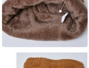 Detail of warm ginger knitted hat with thick brown faux fleece lining for winter insulation