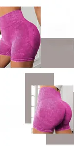 Detail view of high-waisted seamless purple yoga shorts with honeycomb breathable texture