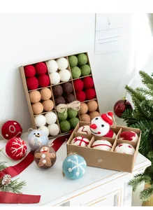 Handmade wool felt Christmas ornaments kit with snowmen and snowflakes in a gift box
