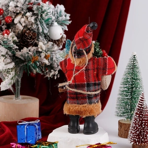 Detailed close-up of a Christmas Santa doll in red plaid fabric with a burlap gift bag