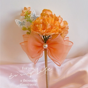 Elegant orange carnation pen with organza bow and embroidered butterfly for gifts