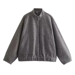 Detailed flat lay of a dark gray stand collar jacket with textured wool fabric