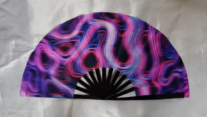 Detail of 10 inch rainbow folding fan with neon fluid art pattern and black bamboo ribs