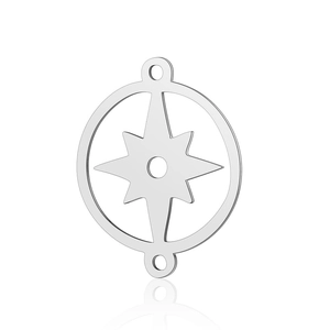 Macro shot of silver compass star connector in stainless steel for jewelry crafting