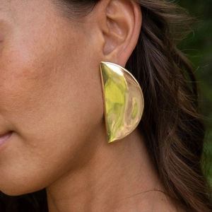 Minimalist golden crescent moon stud earrings for women in oversized geometric style